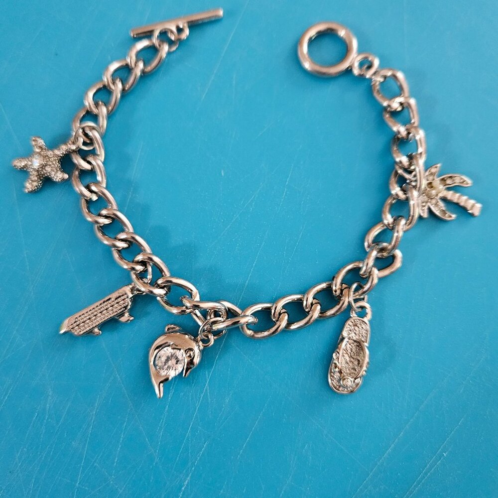 ocean sea bracelet with 5 sea charms very substantial for smaller wrist 6to 7